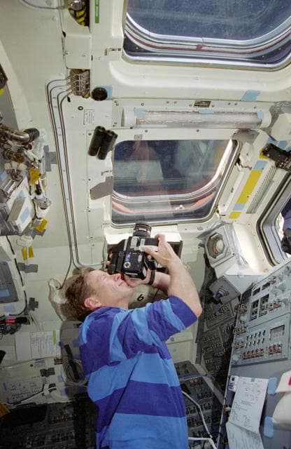 NASA image: MS Gernhardt on aft flight deck with camera