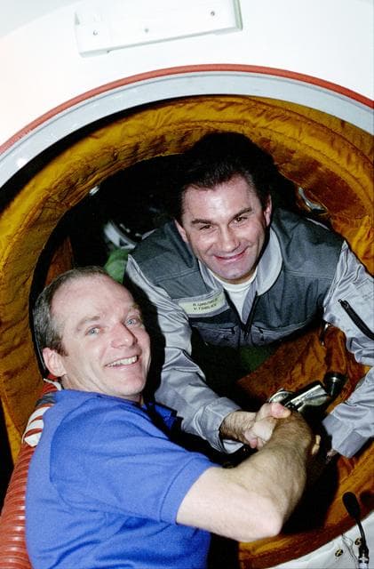 NASA image: Various candid views of STS-84 crew after hatch opening