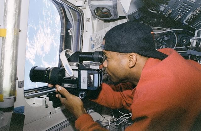 NASA image: Candid views of crew activity in the flight deck and middeck