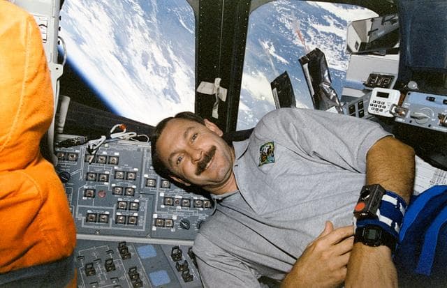 NASA image: Crewmember activity in the flight deck