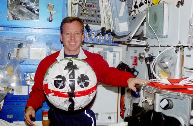 NASA image: RME 1323, AERCam/Sprint held by Lindsey in the middeck