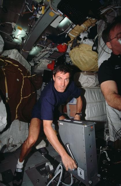 NASA image: Krikalev exercises on the ergometer while on the Endeavour's middeck