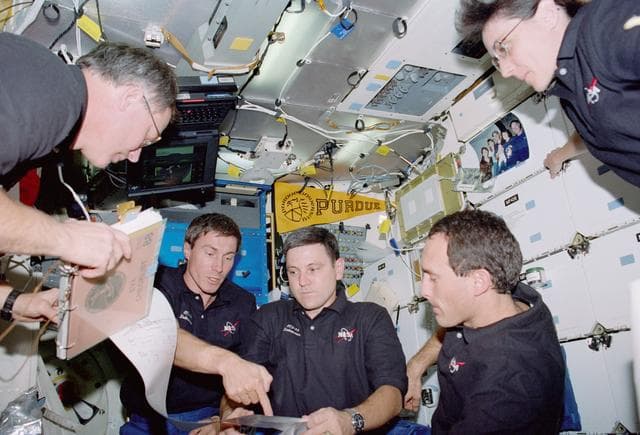 NASA image: View of the STS-88 crew on the middeck
