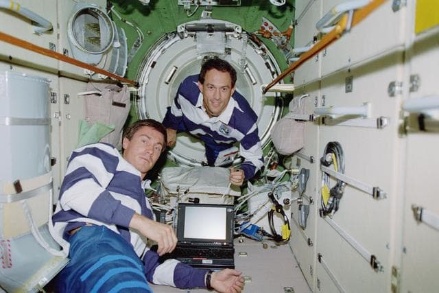 NASA image: View of the STS-88 crew at work in the FGB/Zarya module
