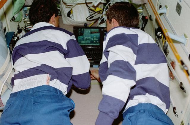 NASA image: Newman and Krikalev during teleconference in the FGB/Zarya module