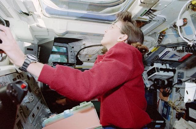NASA image: Currie at aft flight deck controls
