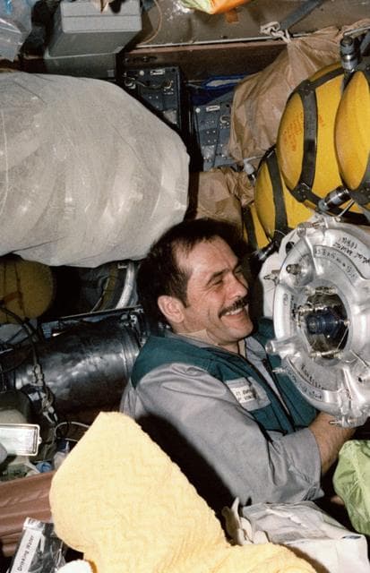 NASA image: Vinogradov organizes stowage bags on Mir