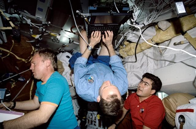 NASA image: Mir 24 and STS-89 crew transfer supplies