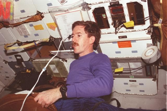 NASA image: MS Reilly transfers equipment between Endeavour and Mir