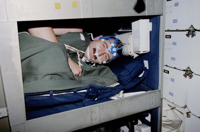 NASA image: SLEEP - Williams wearing sleep net