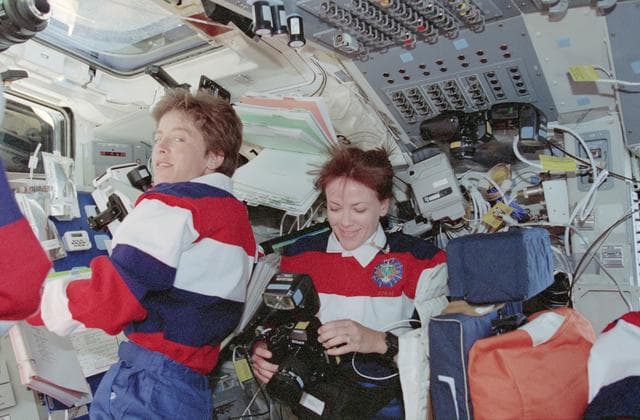 NASA image: Crewmember activity in flight deck during rendezvous operations