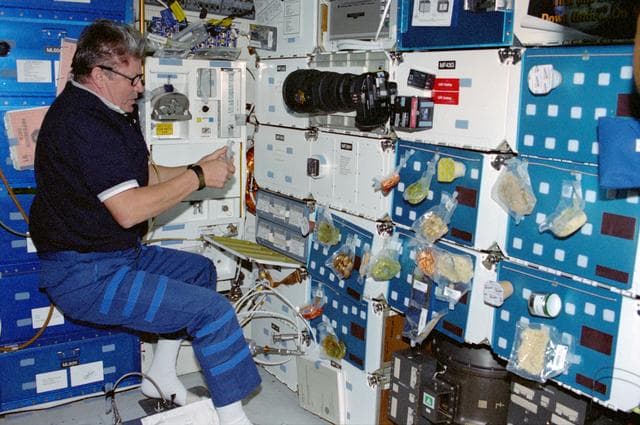 NASA image: Crewmember activity in the shuttle middeck