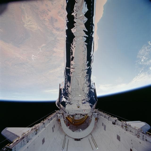NASA image: View of the Chandra Observatory during its deployment from Columbia PLB