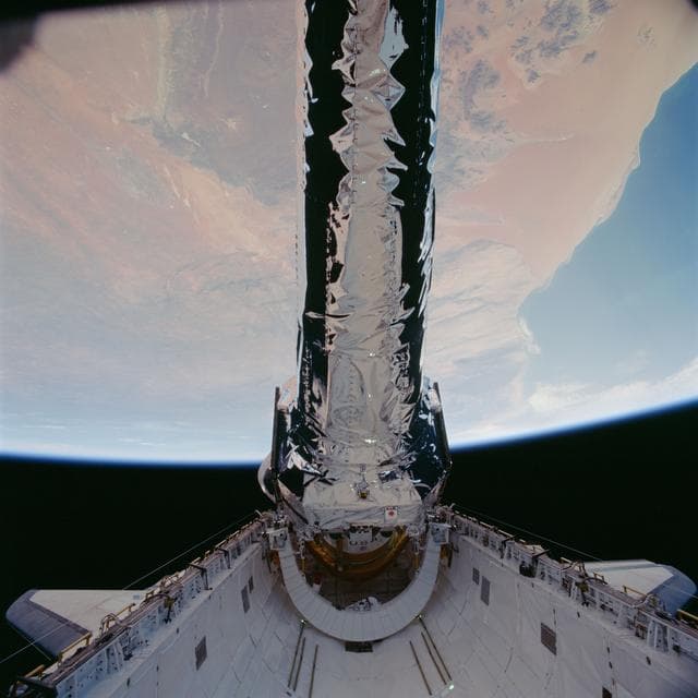NASA image: View of the Chandra Observatory during its deployment from Columbia PLB