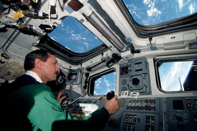 NASA image: Brown at RMS controls on the aft flight deck