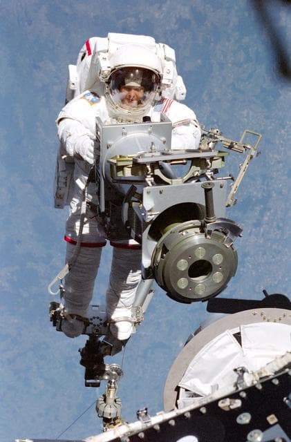 NASA image: Tamara Jernigan installs Strela crane on PMA2 during EVA