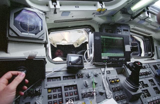 NASA image: View from aft flight deck of undocking with ISS