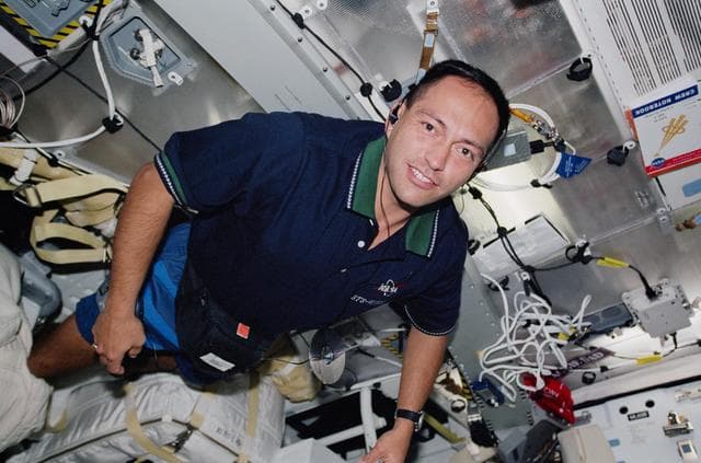 NASA image: MS Noriega listens to a CD player on the middeck during STS-97