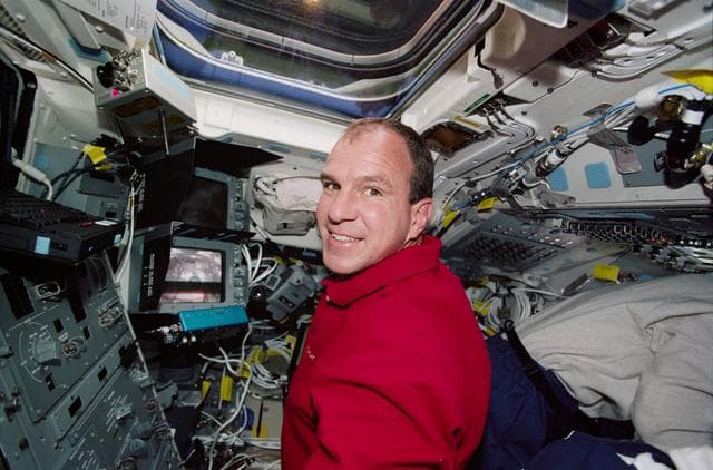 NASA image: Pilot Bloomfield working on the aft flight deck during STS-97