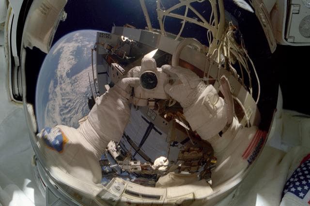 NASA image: MS Tanner takes a picture of himself in his visor during an EVA of STS-97