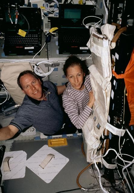 NASA image: MS Jones and Ivins in interdeck hatch