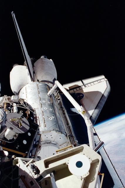 NASA image: U.S. Laboratory / Destiny Module grappled in Atlantis' PLB