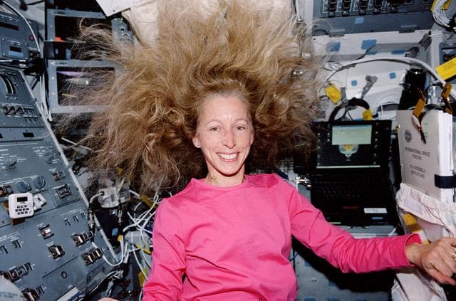 NASA image: MS Ivins with hair loose on the AFD
