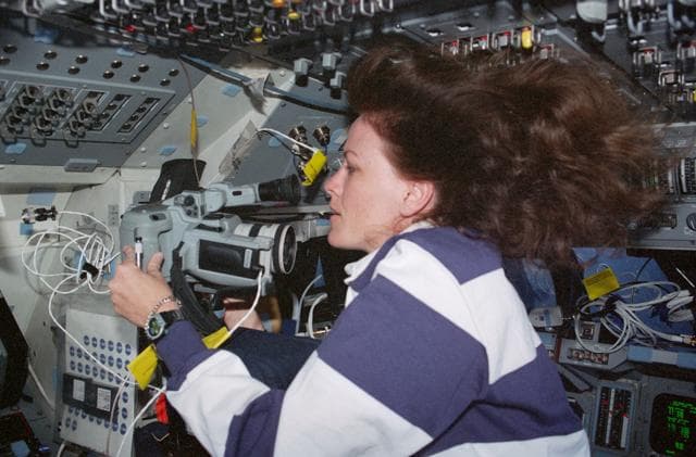 NASA image: STS-99 MS Kavandi sets up a video camera on OV-105's flight deck