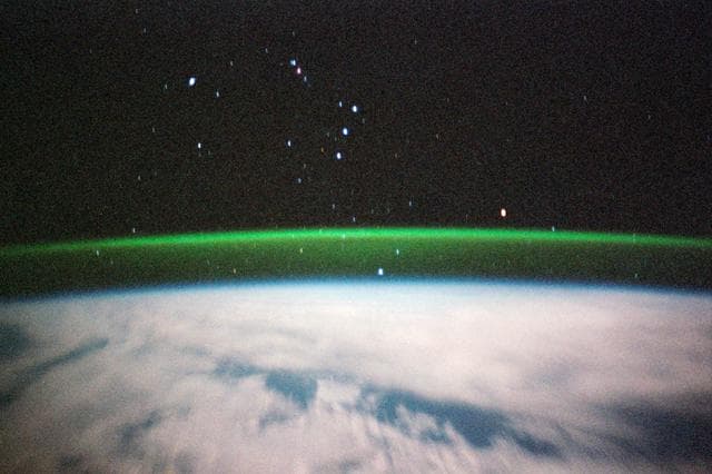 NASA image: Earth limb views with greenish bands of airglow during STS-99