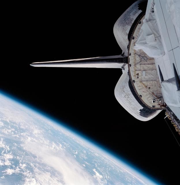 NASA image: Views of Endeavour's payload bay and an Earth limb taken during STS-99