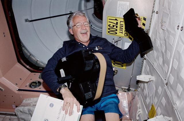 NASA image: MS Phillips handles IMAX camera equipment in Unity during STS-100