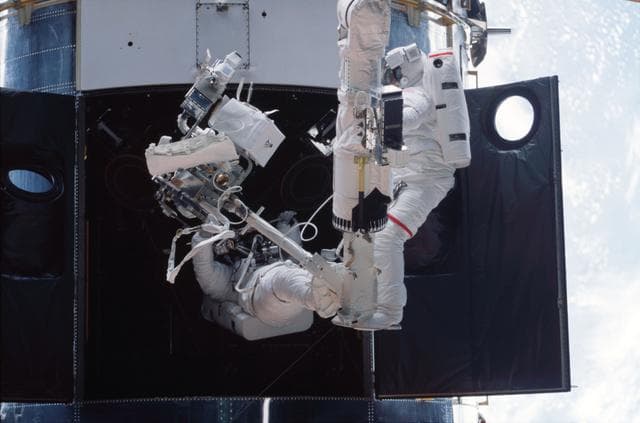 NASA image: 1st EVA - MS Smith and Grunsfeld during RSU changeout