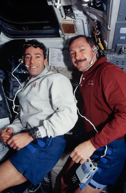 NASA image: Various views of the STS-103 crew on the flight deck
