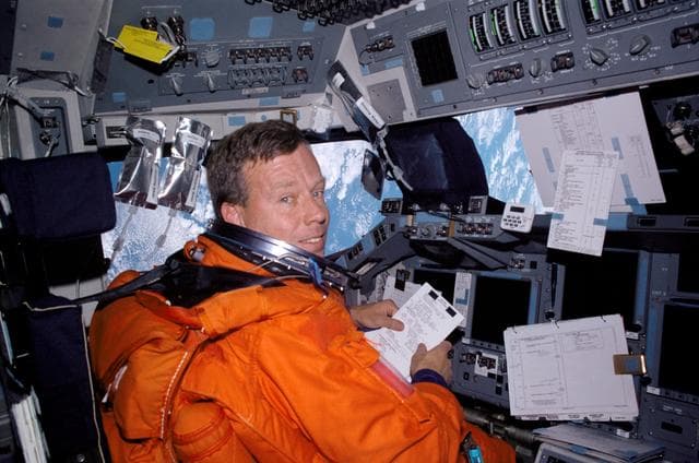 NASA image: STS-104 CDR Lindsey on forward flight deck prior to re-entry