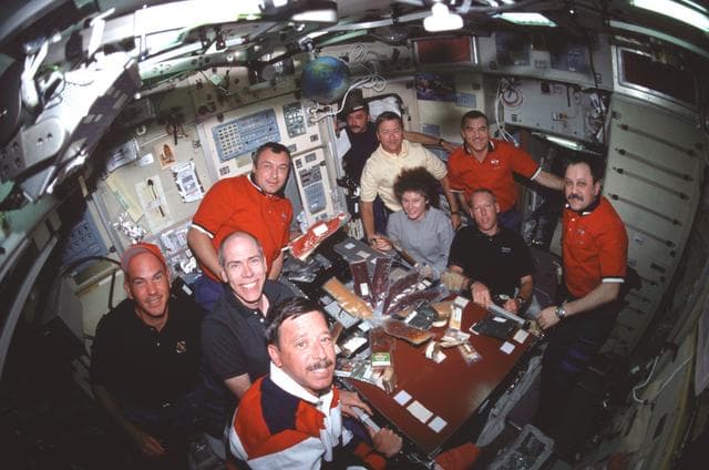 NASA image: Meal time in the ISS Service Module/Zvezda with all three crews
