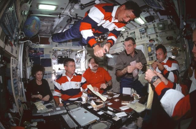 NASA image: Meal time in ISS Service Module/Zvezda