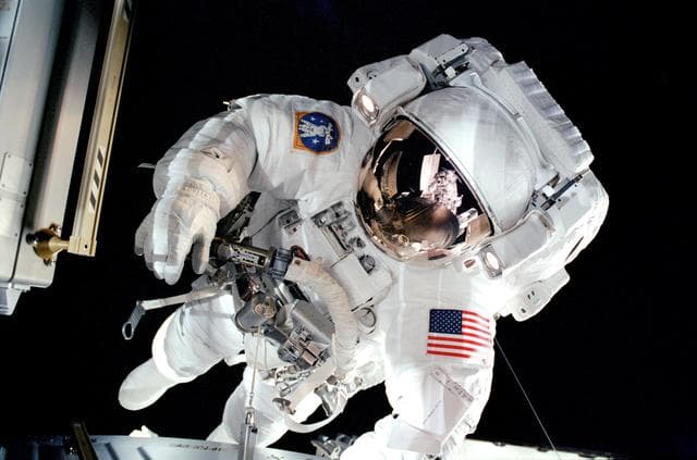 Forrester with a MISSE PEC installed on the ISS Airlock