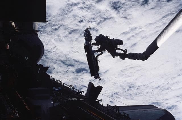 NASA image: EVA 5 - Grunsfeld installs radiator