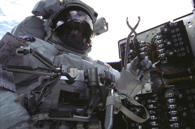 NASA image: EVA 3 - replacement of the Power Control Unit