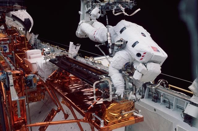 NASA image: EVA 2 - old solar array installed in payload bay