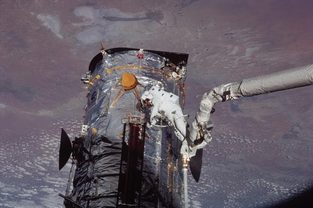 NASA image: EVA 2 - MS Massimino removes old port solar array