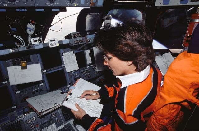 NASA image: STS-109 MS Currie on forward flight deck
