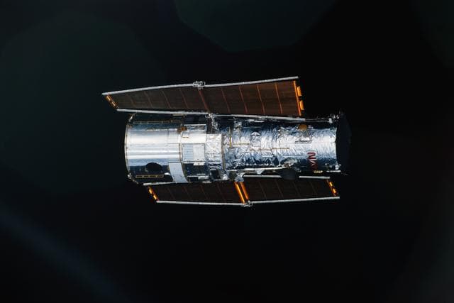NASA image: View of HST prior to rendezvous and capture
