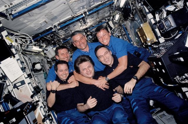 NASA image: Expedition Four and Expedition Five crews group portrait in U.S. Lab taken during STS-111 UF-2