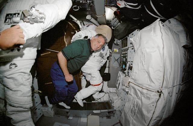 NASA image: Fish-eye view of MS Wolf on middeck