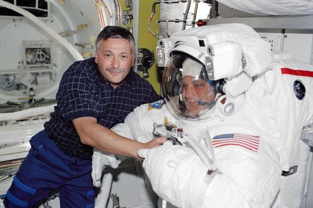 NASA image: STS-112 MS Yurchikhin  with MS Wolf prior to EVA 3