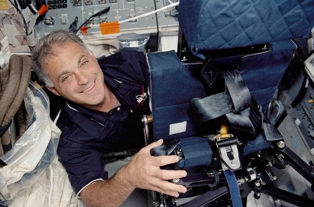 NASA image: STS-112 Wolf with seat on flight deck