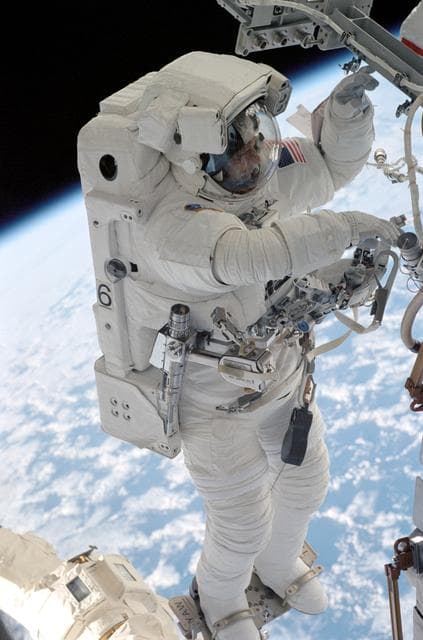 NASA image: EVA 2 - MS Sellers on SSRMS near Destiny laboratory