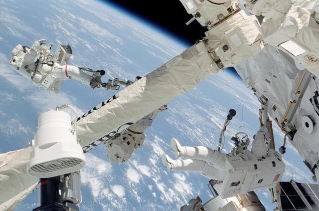 NASA image: EVA 2 - MS Sellers with railing and  MS Wolf on SSRMS