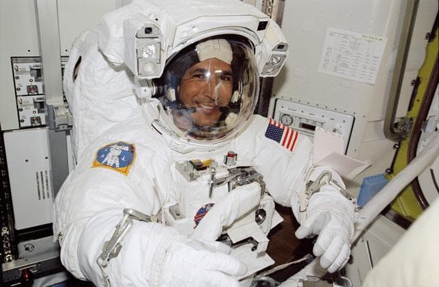 NASA image: Herrington, in EMU, during preparations for STS-113 EVA 1 in the Quest A/L